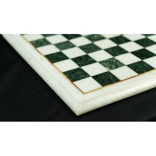 4 - AN INLAID MARBLE CHESS BOARD, Of square form, black and white checkered marble game board, outlined ... 