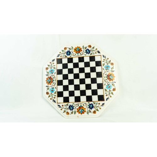 5 - AN OCTAGONAL INLAID MARBLE CHESSBOARD WITH FLOWERS, Of octagonal form, black and white checkered mar... 