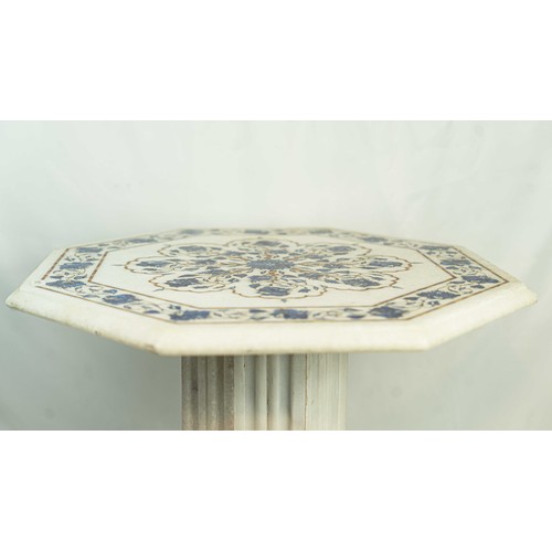 8 - AN INLAID MARBLE COFFEE TABLE, The table top of octagonal form, delicately inlaid with semi-precious... 