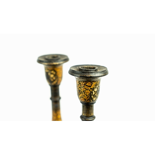 84 - A PAIR OF KASHMIRI LACQUERED CANDLESTICKS, 19TH CENTURY, Each of baluster form, resting on domed foo... 