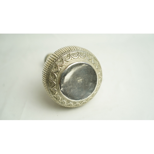 88 - AN OMANI WHITE METAL SURAHI, ROSE WATER FLASK, Of bulbous form, sitting on a circular base, its slen... 