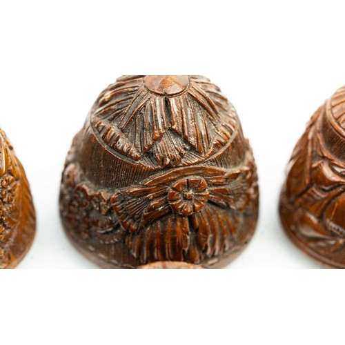 165 - THREE CARVED WOODEN EGGS, INDIA, In the shape of egg, each with  screw covers, intricately carved th... 