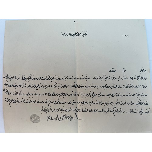 34 - AN 
OFFICIAL LETTER
An official
 letter in Ottoman language, with a seal Rasheed Nasheed,
33.5 x 21 ... 