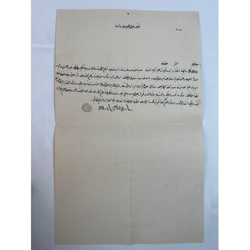 34 - AN 
OFFICIAL LETTER
An official
 letter in Ottoman language, with a seal Rasheed Nasheed,
33.5 x 21 ... 