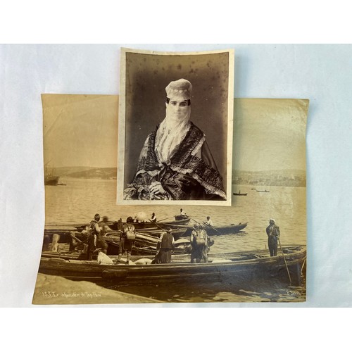 46 - TWO 
OTTOMAN ERA PHOTOGRAPHS 
The landing 
stage of `Tophane 25 x 19.2cm

A Veiled Turkish lady 14.7... 