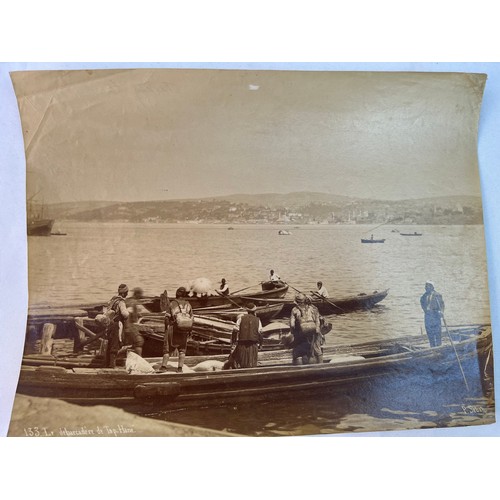 46 - TWO 
OTTOMAN ERA PHOTOGRAPHS 
The landing 
stage of `Tophane 25 x 19.2cm

A Veiled Turkish lady 14.7... 