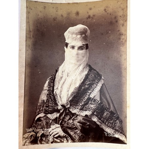 46 - TWO 
OTTOMAN ERA PHOTOGRAPHS 
The landing 
stage of `Tophane 25 x 19.2cm

A Veiled Turkish lady 14.7... 