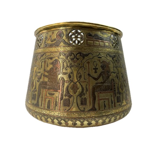 16 - A 19TH CENTURY 
MIDDLE EASTERN TINY BRASS JARDINIERE

Of deep rounded form with sides tapering to ro... 