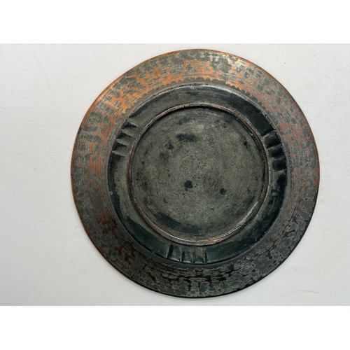 19 - ARMENIAN COPPER PLATE

Of circular form, resting on short foot, a central medallion chased with band... 