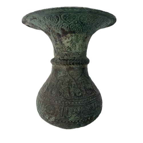 23 - A KHURASSAN  VASE
Of bulbous form, resting on a flat base, a large everted rim, both exterior and in... 