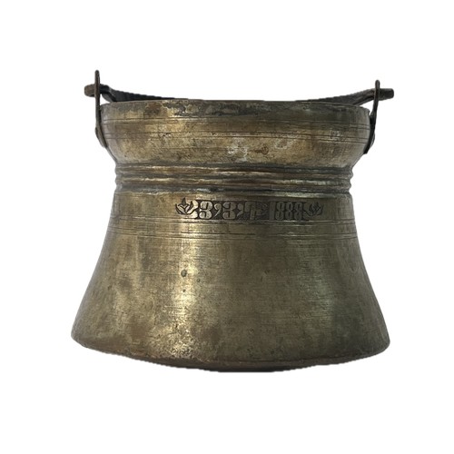 17 - AN ARMENIAN COPPER BUCKET

Of typical form, dated 3/3/1888 510 gr
13 cm mouth dia
approx..14 cm high