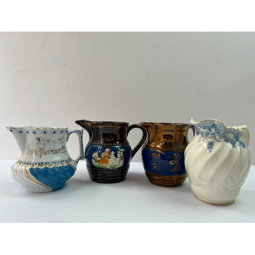 36 - A SET OF FOUR PORCELAIN MILK JUGS
747 gr
each approx.. 10 cm