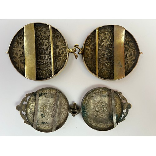 47 - A PAIR OF GILT BELT BUCKLES
Of rounded
 form, each with floral and foliate embossed decoration78 gr,... 