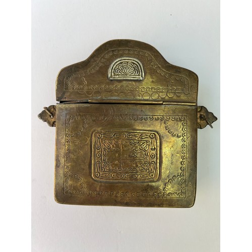 52 - A METAL 
AND BRASS NOMAD QUR’AN BOX OR CASE, MOROCCO, 20TH CENTURY
Of rectangular form with with a h... 