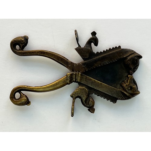 54 - A METAL SUGAR AND BETEL NUT CRACKER
A brass sugar and nut cracker, featuring two scissor-like handle... 