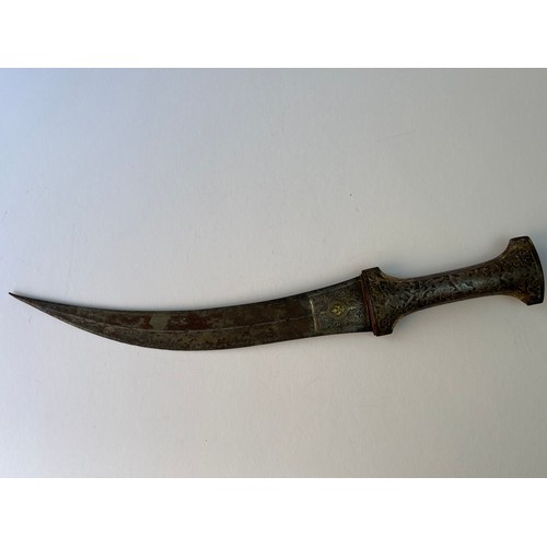 69 - A CURVED DOUBLE-EDGED DAGGER
With a double-edged blade with a medial ridge, koftehari arabesque at t... 