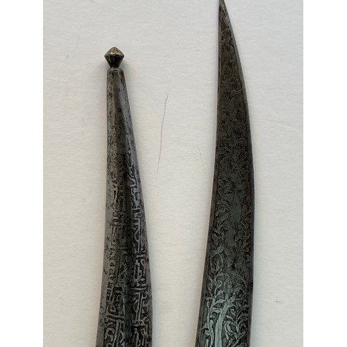 70 - A DOUBLE-EDGED BLADE WITH SCABBARD
With a double-edged, slightly curved steel blade decorated with s... 