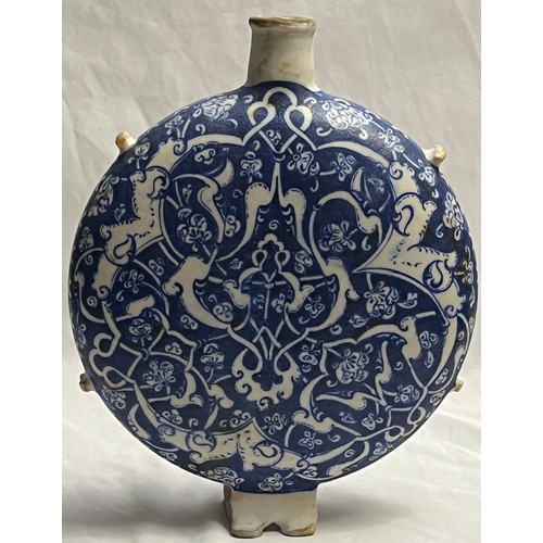 84 - IZNIK STYLE KUTAHYA PORCELAIN FLASK, TURKEY, LATE 19TH - EARLY 20TH CENTURY
Of circular form, the bo... 