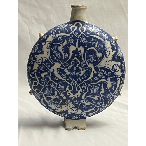 84 - IZNIK STYLE KUTAHYA PORCELAIN FLASK, TURKEY, LATE 19TH - EARLY 20TH CENTURY
Of circular form, the bo... 