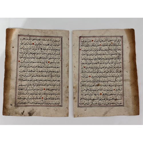 109 - TWO CONSECUTIVE QUR’AN LEAVES, WITH SURA AL-TAWBAH (9:2-23)
Arabic manuscript on paper, 15ll of blac... 