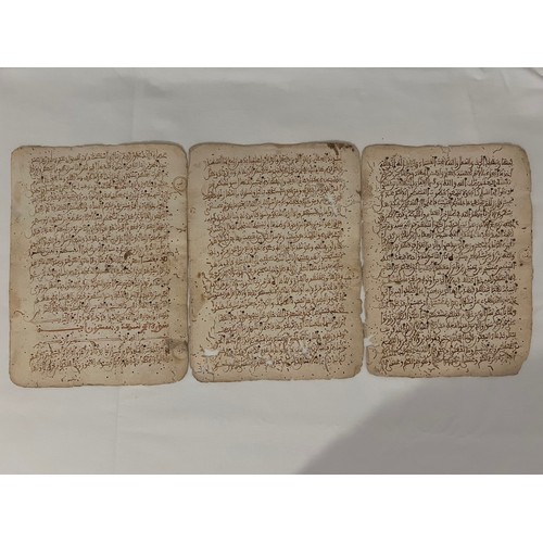 110 - THREE MAGHRIBI QUR’AN FOLIOS, NORTH AFRICA OR SPAIN, 13TH/14TH  CENTURY
Qur’an XII. Sura al-Yusuf vv... 