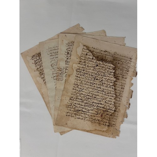 119 - FOUR FOLIOS FROM A HADITH BOOK, NORTHERN AFRICA, 17TH CENTURY
An Arabic manuscript on paper, 28ll. o... 