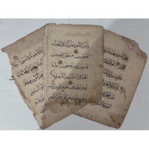 129 - THREE FOLIOS FROM A MAMLUK QURAN, 14TH CENTURY, EGYPT OR SYRIA
Arabic manuscript on paper, 6ll. of b... 