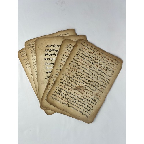 41 - SEVEN FOLIOS FROM A HADITH BOOK, NORTH AFRICA, LATE 18TH - EARLY 19H CENTURY 

Arabic manuscript on ... 