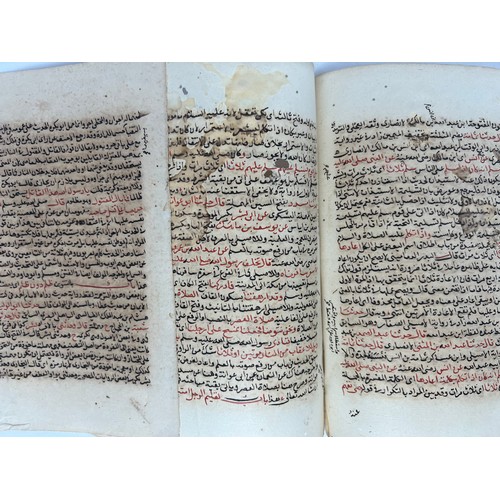 44 - A BIFOLIO AND A FOLIO FROM A HADITH BOOK, NORTHERN AFRICA, 19TH CENTURY 

Arabic manuscript on paper... 