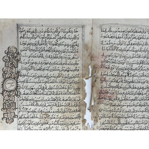 58 - A BIFOLIO FROM A SUDANESE QURAN, SUB-SAHARAN, NIGER, CHAD, 19TH CENTURY 

Arabic manuscript on paper... 