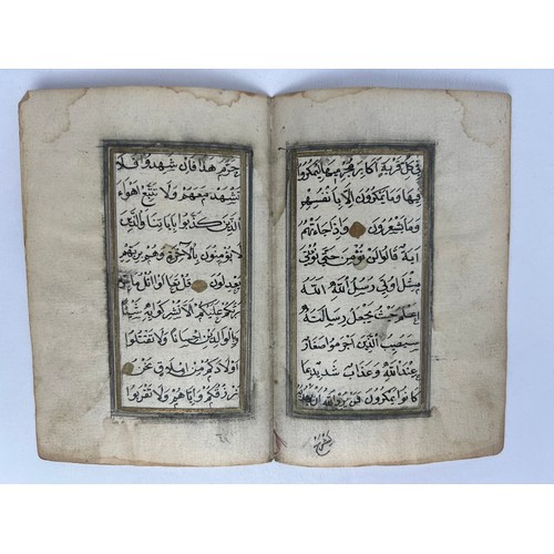 59 - A BIFOLIO FORM AN OTTOMAN QURAN, OTTOMAN TURKEY, 19TH CENTURY 

Arabic manuscript on paper, 9ll of b... 