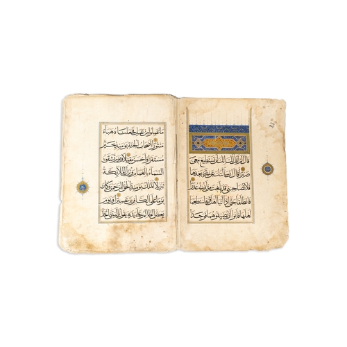 14 - AN ILKHNAID QUR’AN SECTION, JUZ 16, 
IRAN, 14TH CENTURY.  Arabic manuscript on paper, 15 folios,7 li... 