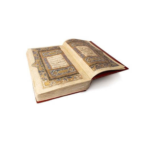 15 - A MASSIVE HERAT QUR’AN   Arabic manuscript on paper, 14 lines of black naskh script,lobbed gold rpou... 