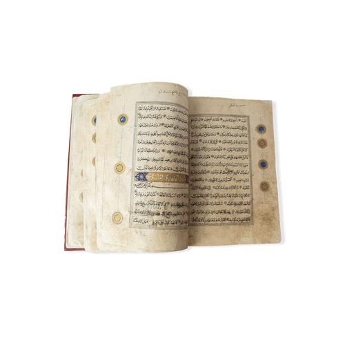 15 - A MASSIVE HERAT QUR’AN   Arabic manuscript on paper, 14 lines of black naskh script,lobbed gold rpou... 