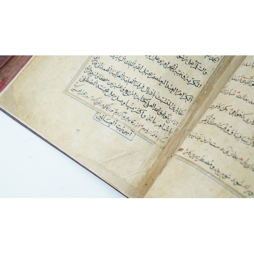 22 - A QUR’AN SIGNED DUST MUHAMMAD BUKHARI, HERAT, 16TH CENTURY  Arabic manuscript on paper, 356ff., 12 l... 