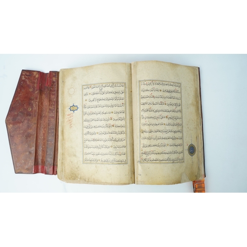 22 - A QUR’AN SIGNED DUST MUHAMMAD BUKHARI, HERAT, 16TH CENTURY  Arabic manuscript on paper, 356ff., 12 l... 