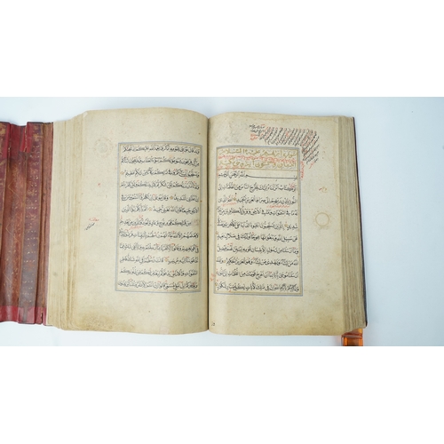 22 - A QUR’AN SIGNED DUST MUHAMMAD BUKHARI, HERAT, 16TH CENTURY  Arabic manuscript on paper, 356ff., 12 l... 