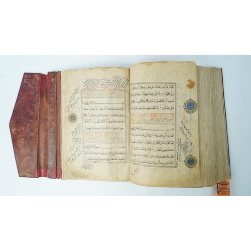 22 - A QUR’AN SIGNED DUST MUHAMMAD BUKHARI, HERAT, 16TH CENTURY  Arabic manuscript on paper, 356ff., 12 l... 