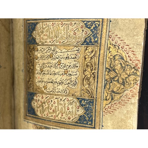 9 - A TIMURID QUR’AN 15TH CENTURY  Arabic manuscript on paper, 16 lines of black naskh script, gold roun... 