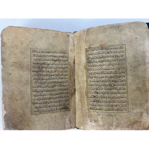 9 - A TIMURID QUR’AN 15TH CENTURY  Arabic manuscript on paper, 16 lines of black naskh script, gold roun... 