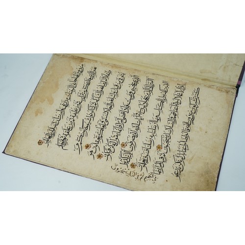 33 - A QUR'AN SECTION   Arabic manuscript on paper, 9 folios plus two flyleaves, 9 lines of elegant black... 