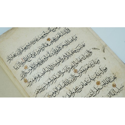 33 - A QUR'AN SECTION   Arabic manuscript on paper, 9 folios plus two flyleaves, 9 lines of elegant black... 