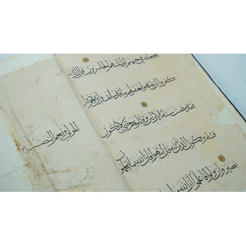 34 - A MONUMENTAL MAMLUK OR ILKHANID JUZ, 14TH CENTURY   Qur’an juz IX.
Arabic manuscript on paper, 5 lin... 