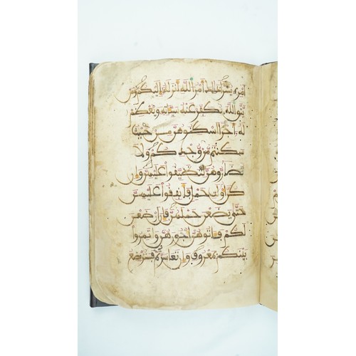 37 - AN ANDOLUIS QUR’AN SECTION NORTH AFRICA OR ANDALUSIA 13TH CENTURY    Starting from Qur’an LXIII. Sur... 