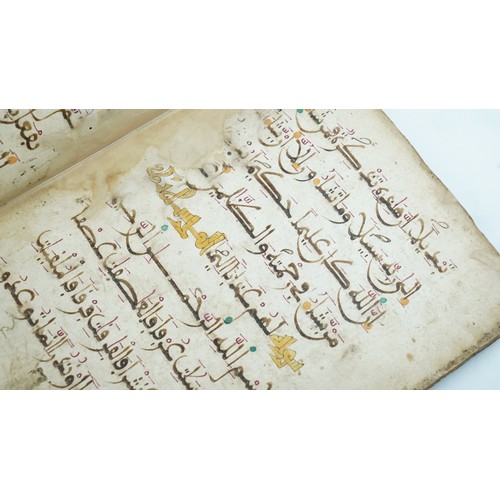 37 - AN ANDOLUIS QUR’AN SECTION NORTH AFRICA OR ANDALUSIA 13TH CENTURY    Starting from Qur’an LXIII. Sur... 