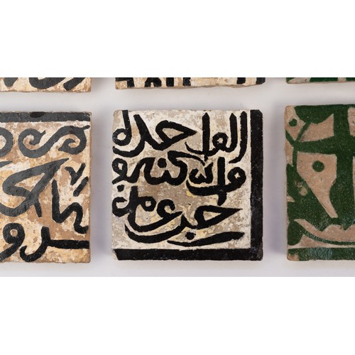 39 - EIGHT CALLIGRAPHIC ZILIG POTTERY TILES
NORTH AFRICA
14TH CENTURY   Each square form, Arabic inscript... 