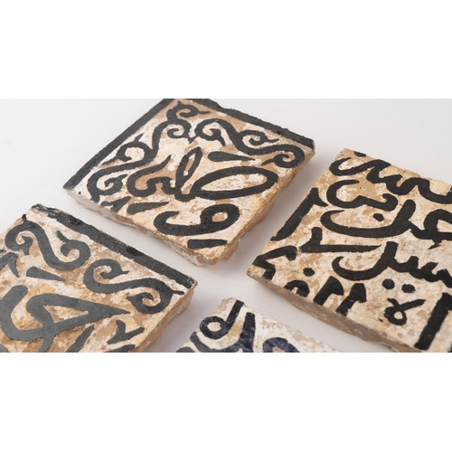 39 - EIGHT CALLIGRAPHIC ZILIG POTTERY TILES
NORTH AFRICA
14TH CENTURY   Each square form, Arabic inscript... 