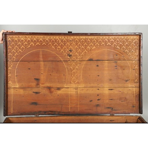 44 - A LAVISHLY ENGRAVED WOODEN CHEST
NORTH AFRICA OR SPAIN   Of typical rectangular shape, the chest wit... 