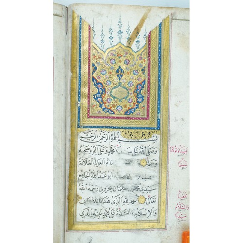 64 - MUHAMMAD BIN SULAYMAN AL- JAZULI ( D1465 AD)
DALA’IL KHAYRAT ,
18TH CENTURY
SIGNED BY BICHAKCIZADEH ... 