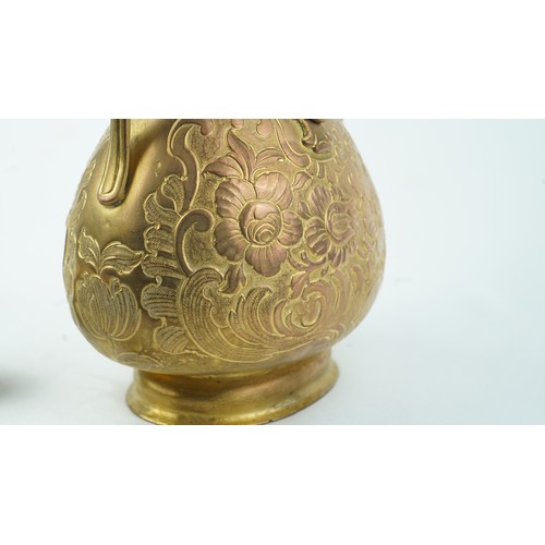 78 - A GILT-COPPER (TOMBAK) ZAM ZAM EWER
OTTOMAN  Of pyriform form, the tombak ewer on a splayed rounded ... 